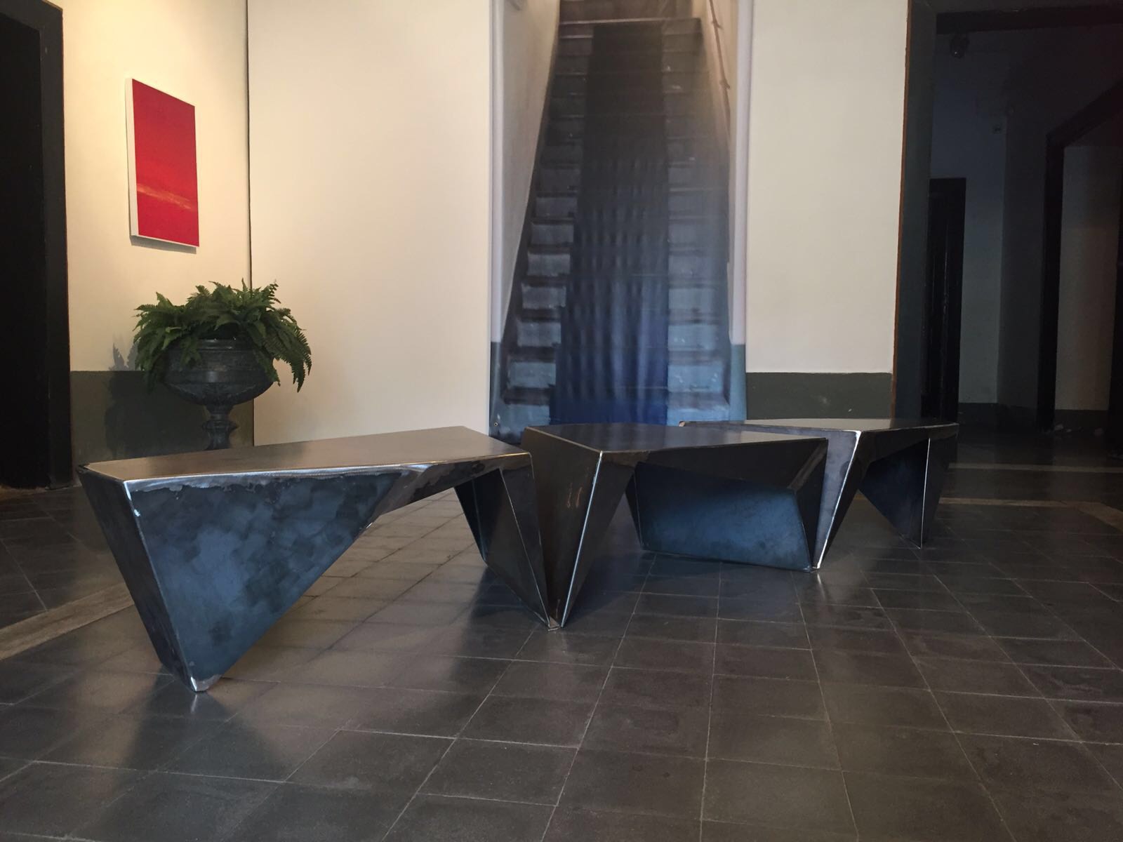 Tri‑part black steel coffee table