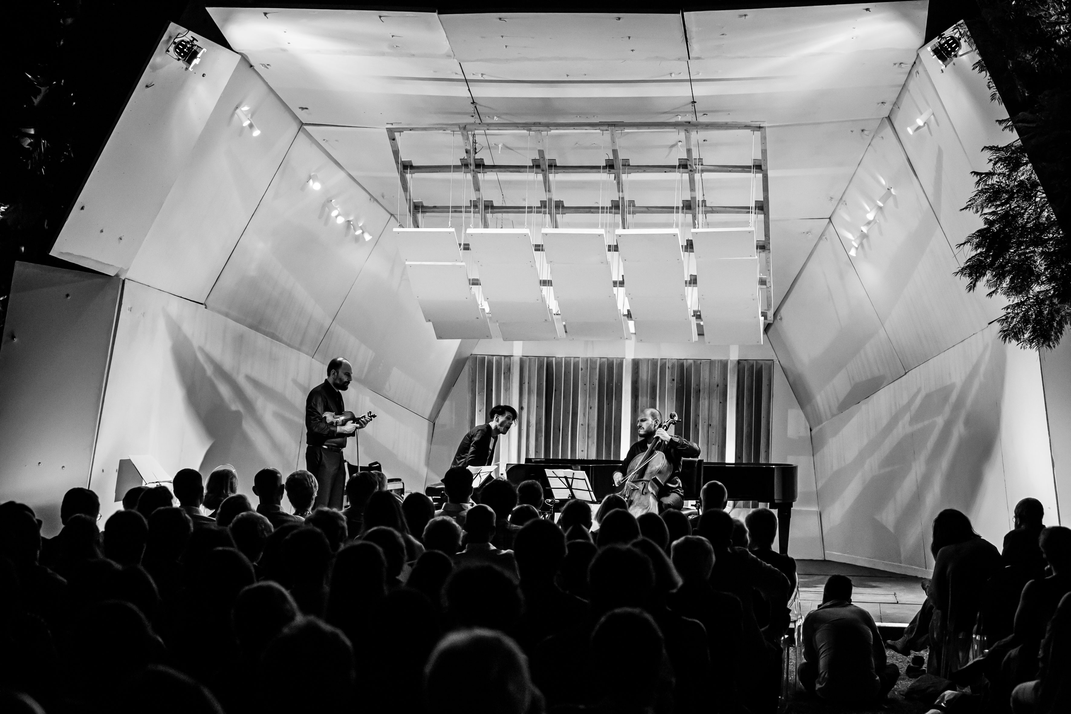 Timber acoustic shell on festival stage